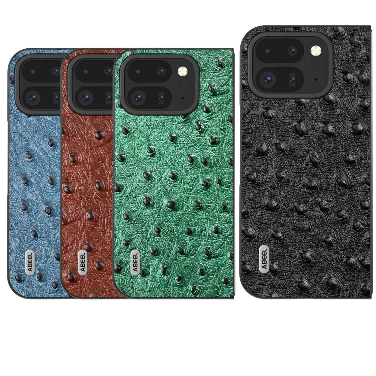 Set of ostrich-textured leather fold phone cases in blue, brown, green, and black