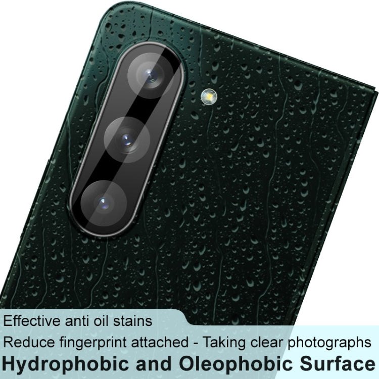 Integrated glass lens film with three camera cutouts and water-drop texture finish