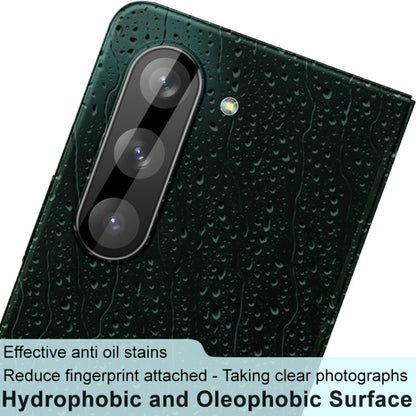 Integrated glass lens film with three camera cutouts and water-drop texture finish