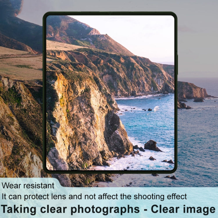 Transparent protective glass lens film overlay on a foldable phone camera area