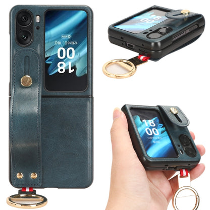 Blue leather back phone case with camera cutout, wrist strap and gold keyring.