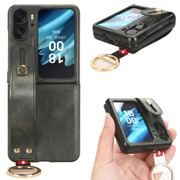 Dark green leather back phone case with camera cutout, wrist strap and gold keyring.