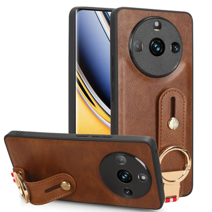 Tan leather back phone case with wrist strap and gold ring, camera cutouts