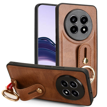 Tan-brown leather wrist strap phone case with fold-over flap, camera cutout, and ring pull