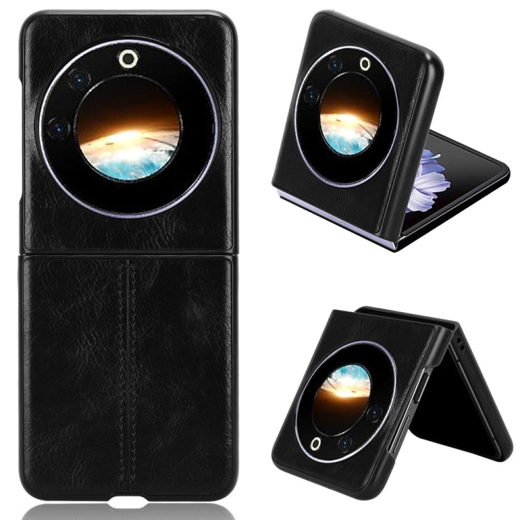 Textured flip phone case with round camera cutout, black finish