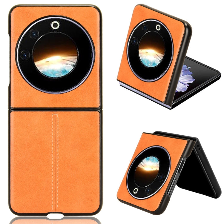 Textured flip phone case with round camera cutout, orange finish