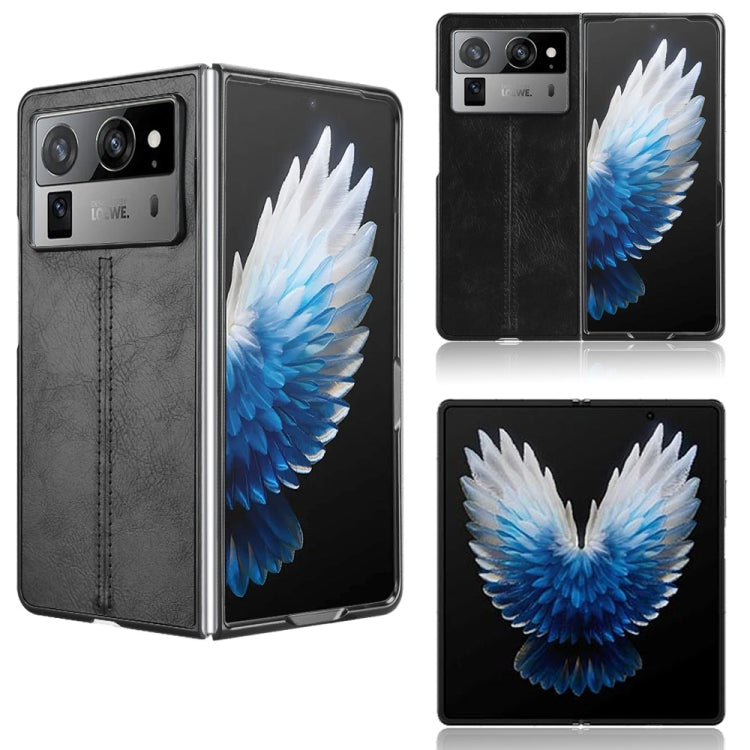 Foldable phone case with blue wing graphic, black leather-style cover, camera cutouts