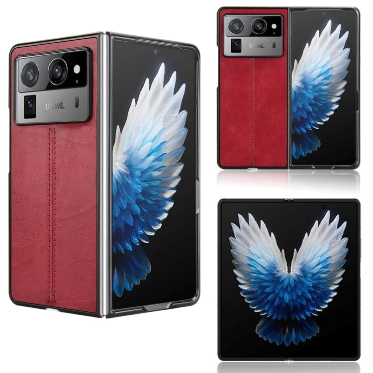Textured flip phone case, red and black with white-blue wing graphic panel