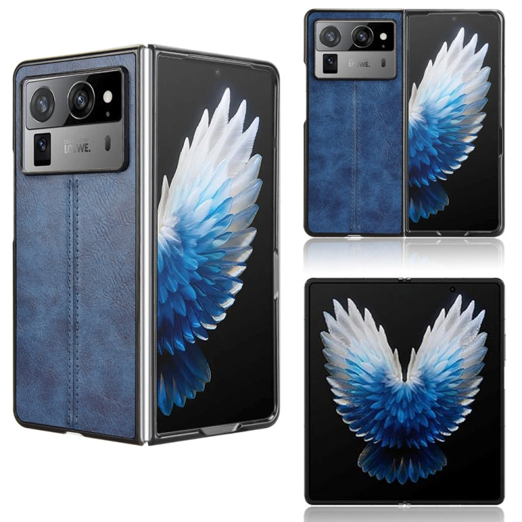 Textured flip phone case, blue and black with white-blue wing graphic panel