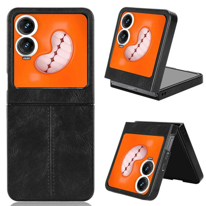 Foldable phone case with cow graphic, orange and black, dual camera cutouts