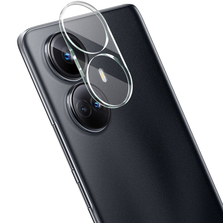 Clear integrated glass lens film sheet on rear camera lenses of a smartphone