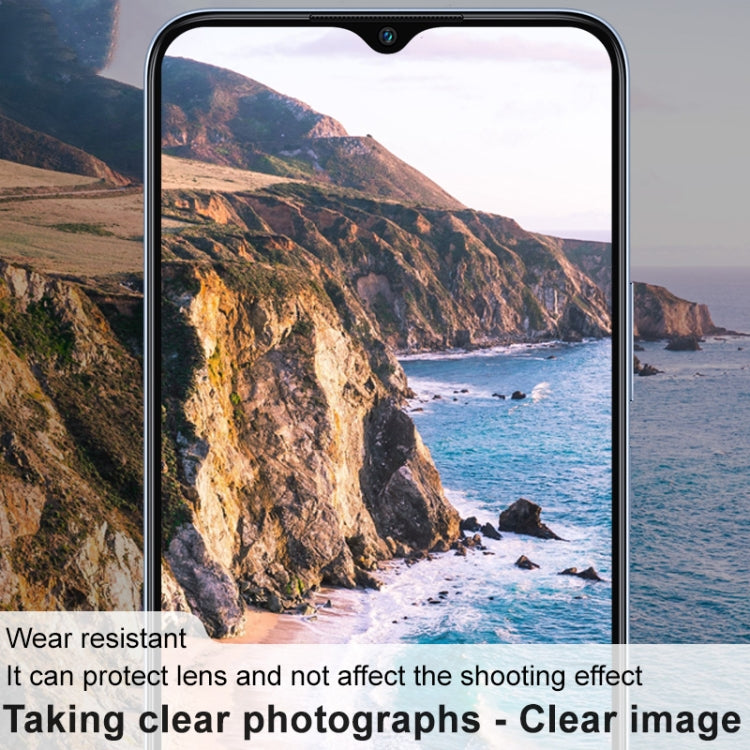 Clear glass lens film on the phone rear camera lenses for transparent protection.