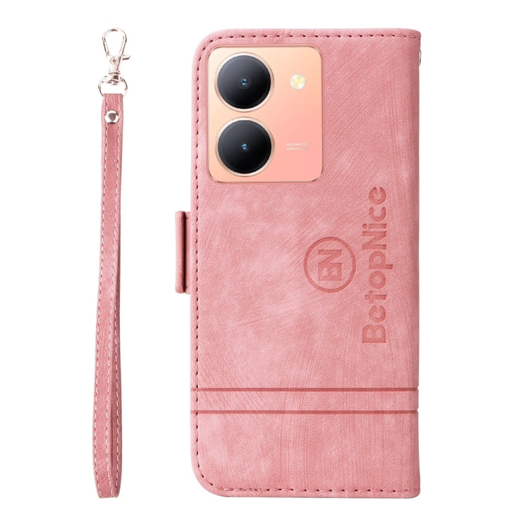 Pink leather flip phone case with camera cutout and wrist strap; dual-side buckle.