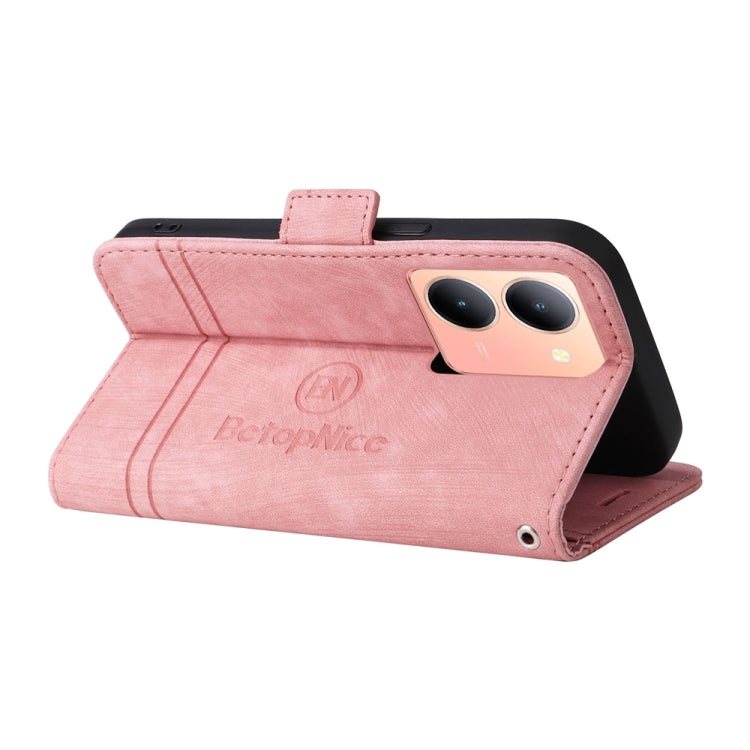 Pink leather flip phone case with flip cover and camera opening; stand-style fold.