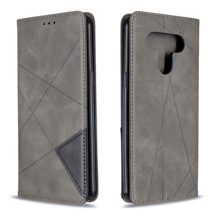 Grey rhombus-pattern flip phone case with magnetic closure, card slots, and cutout for camera