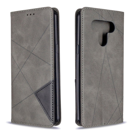 Grey rhombus-pattern flip phone case with magnetic closure, card slots, and cutout for camera