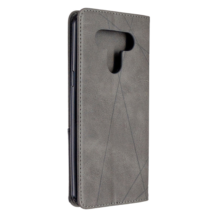 Grey flip phone case with rhombus texture and camera cutout, slim protective design