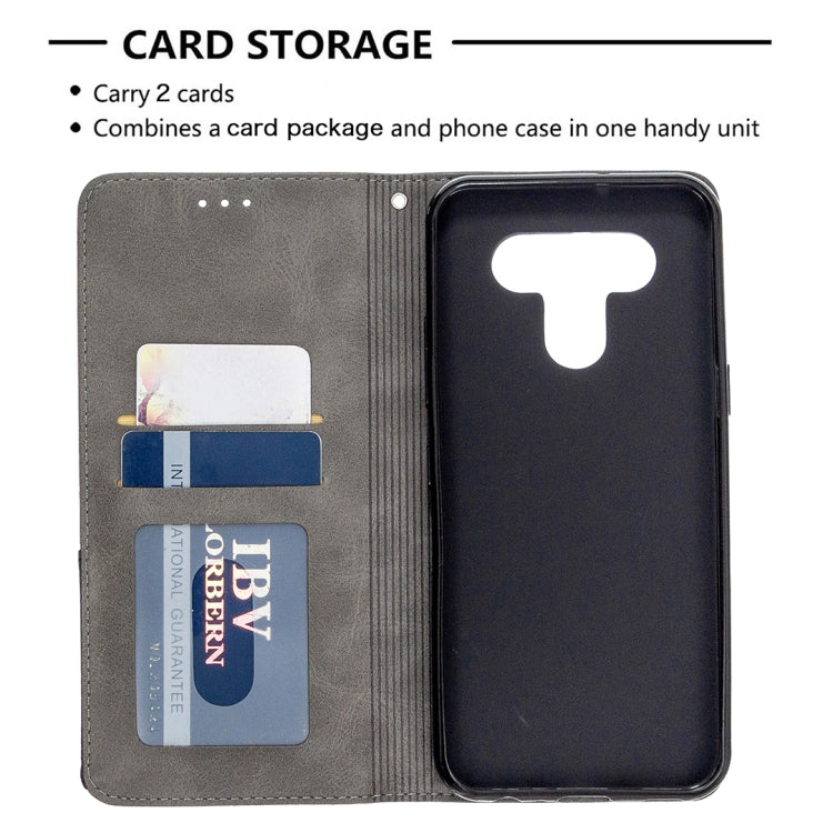 Grey flip phone wallet case with rhombus texture and card slots holding cards