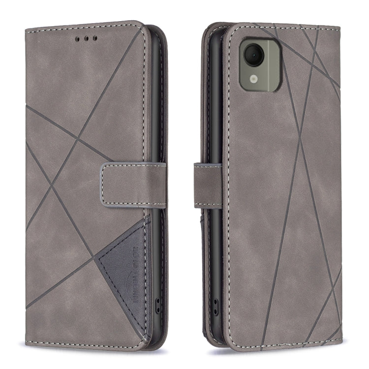 Grey leather phone case with magnetic buckle and geometric rhombus pattern.