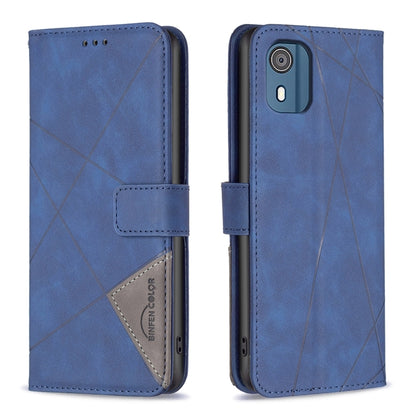 Blue leather phone case with magnetic buckle and geometric rhombus pattern.