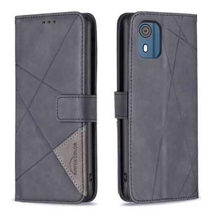 Dark blue leather phone case with magnetic buckle and geometric rhombus pattern.