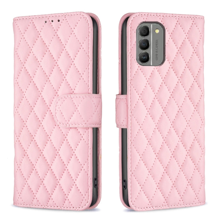 Diamond lattice wallet flip phone case in pink, front and back views with magnetic strap