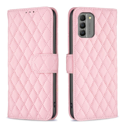Diamond lattice wallet flip phone case in pink, front and back views with magnetic strap