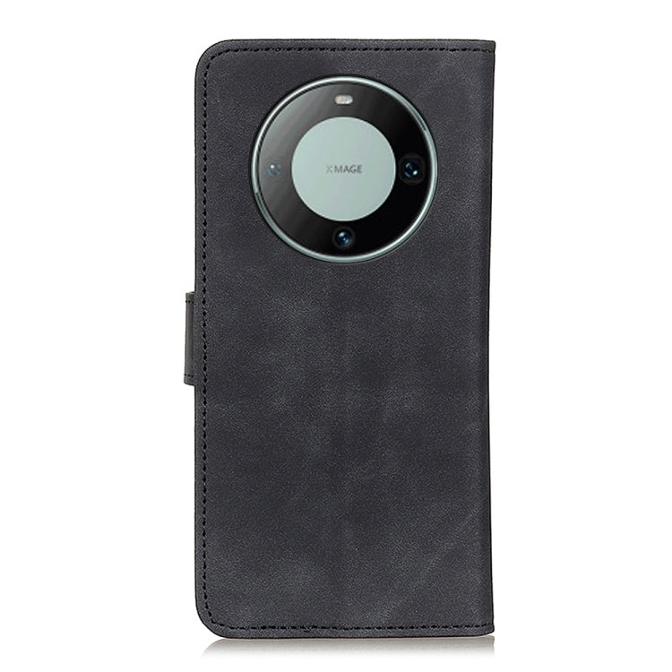 Black flip leather phone case with camera cutout and protective back cover.