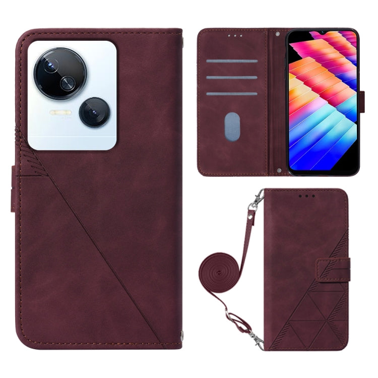 Crossbody flip leather phone case in wine red, embossed design, wrist strap, card slots
