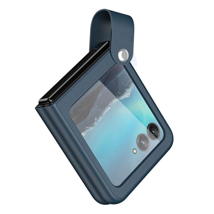 Dark blue leather phone case with hand strap, window cutout, and camera openings.