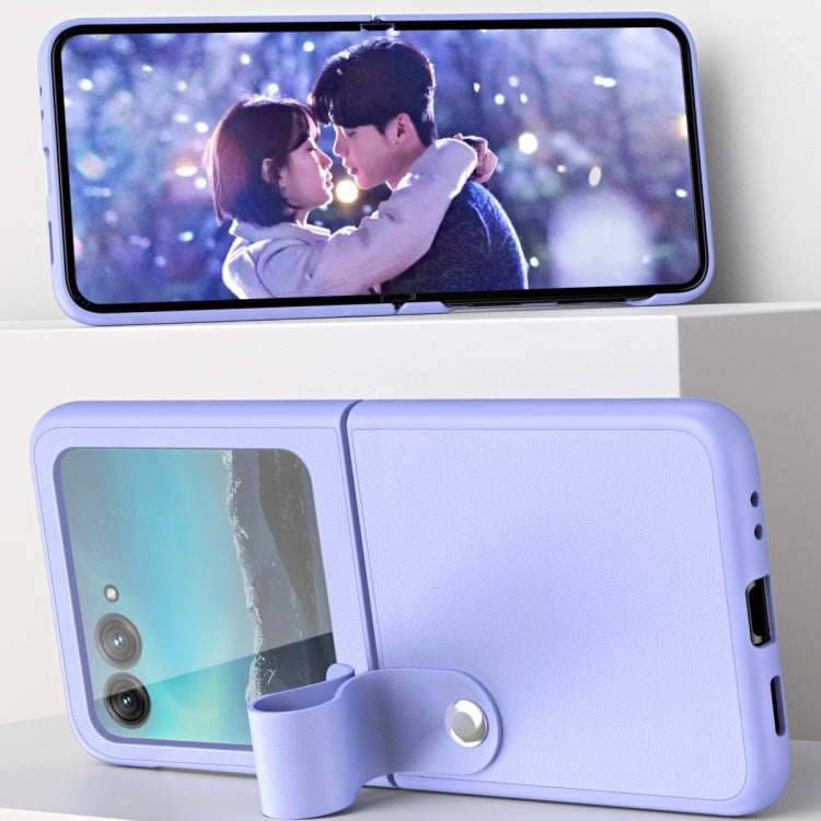 Lavender leather phone case with hand strap and visible phone screen.
