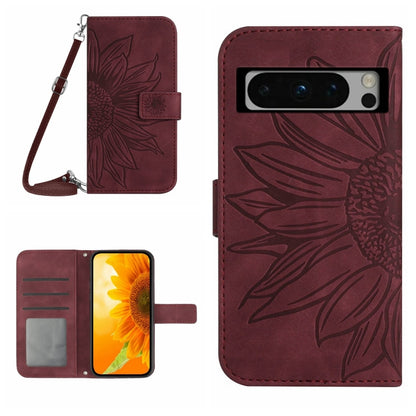 Wine red embossed sunflower flip leather phone case with lanyard and card slots