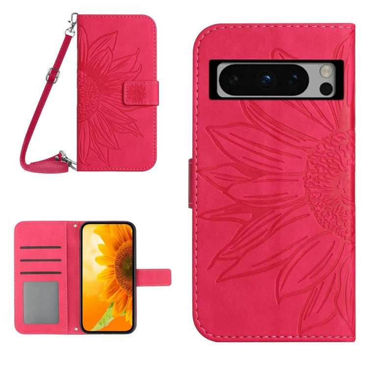 Pink embossed sunflower flip leather phone case with lanyard and card slots