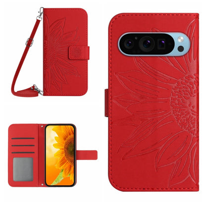 Red sunflower embossed flip leather phone case with lanyard and card slots