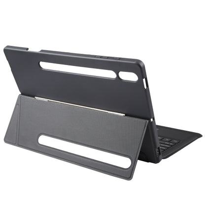 Pivoting tablet keyboard case with dark stand arms and raised hinge, side angle