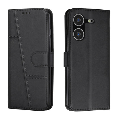 Black leather flip phone case with stitched texture and buckle closure.