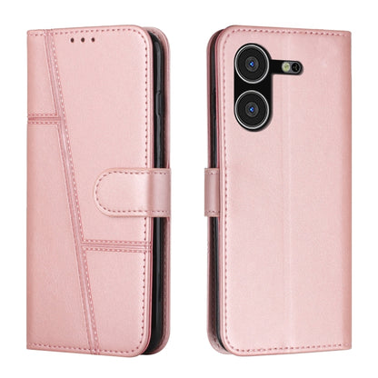 Rose pink leather flip phone case with stitched panels and buckle strap.
