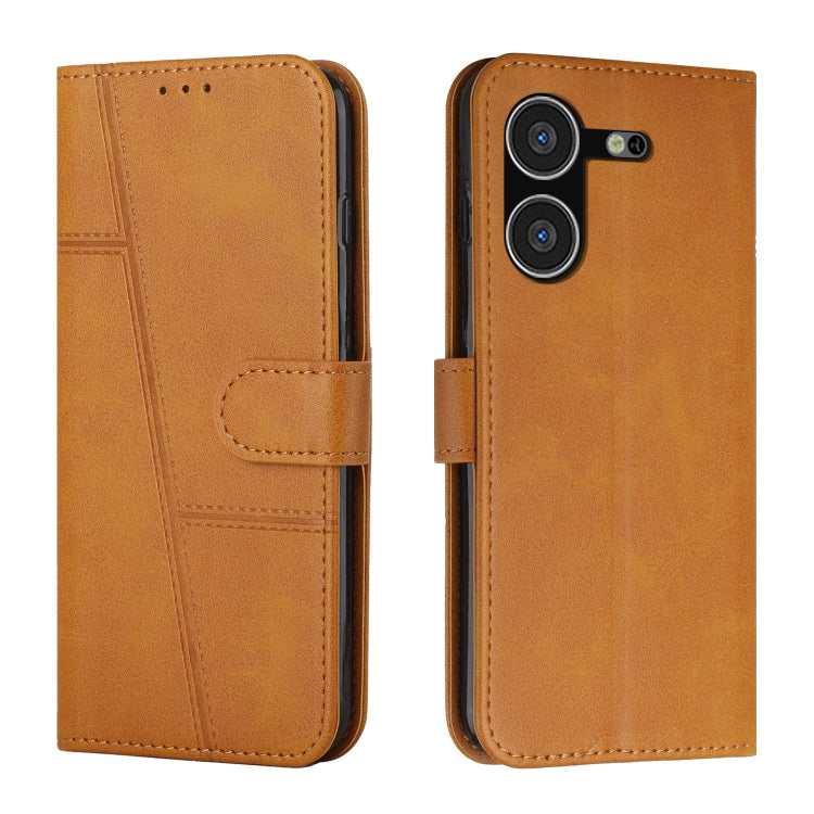 Brown leather flip phone case with stitched panels and buckle strap.