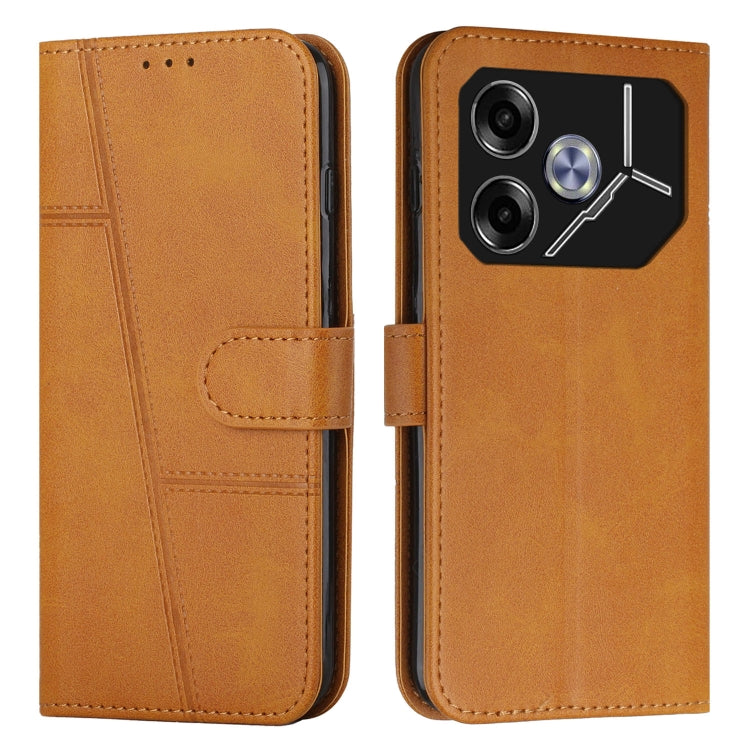Tan leather phone case with buckle strap, stitched design panel, and front folio cover