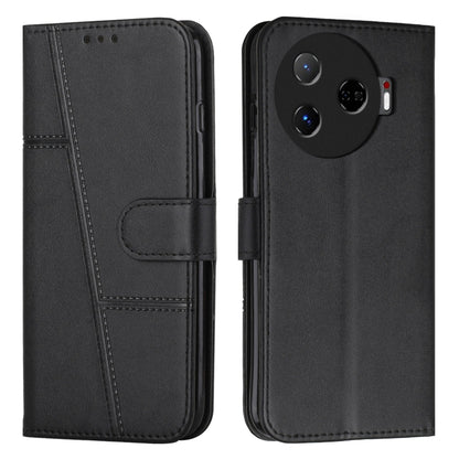 Black leather phone case with buckle strap, stitched folio panel, and camera cutout