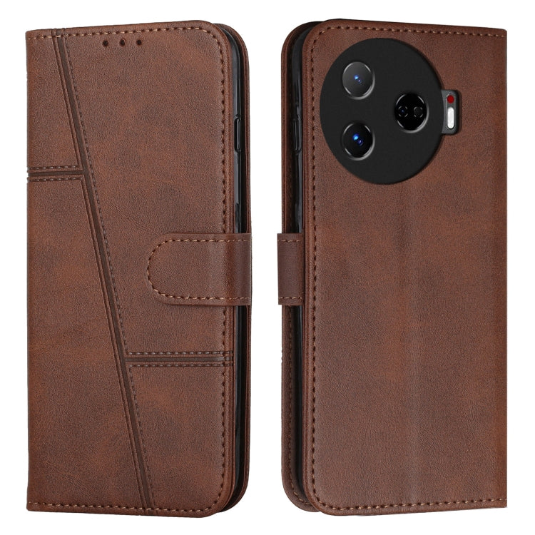 Brown leather phone case with buckle strap, stitched accents, and folio cover with slots
