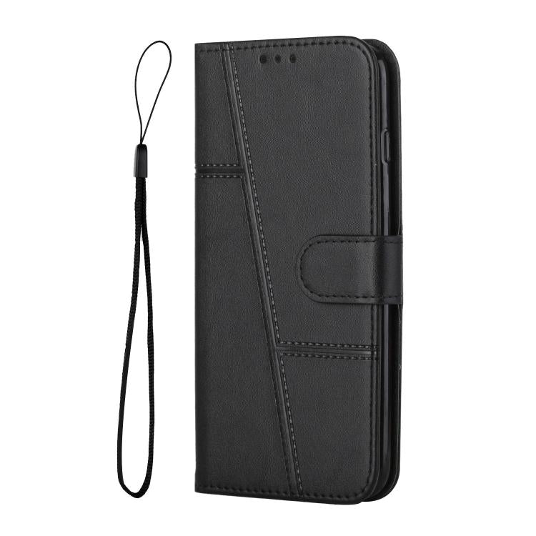 Black leather folio phone case with wrist strap, stitched panel, and fold-over cover