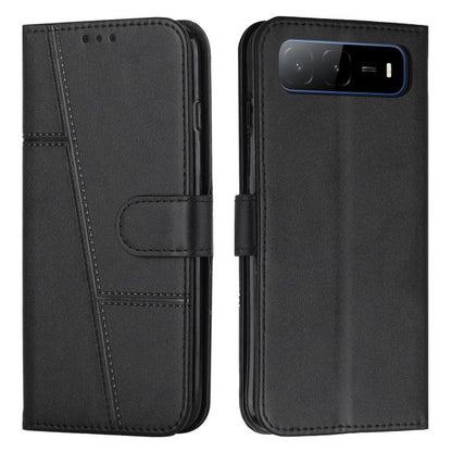 Black leather phone case with buckle, stitched panels, and top cutout