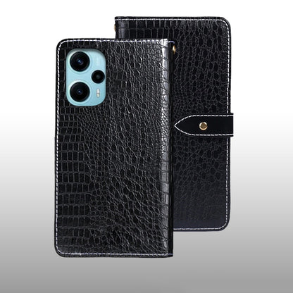 Black crocodile-texture leather flip phone case with wrist strap and magnetic tab.