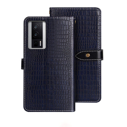Dark blue crocodile-texture leather flip phone case with wrist strap and magnetic tab.