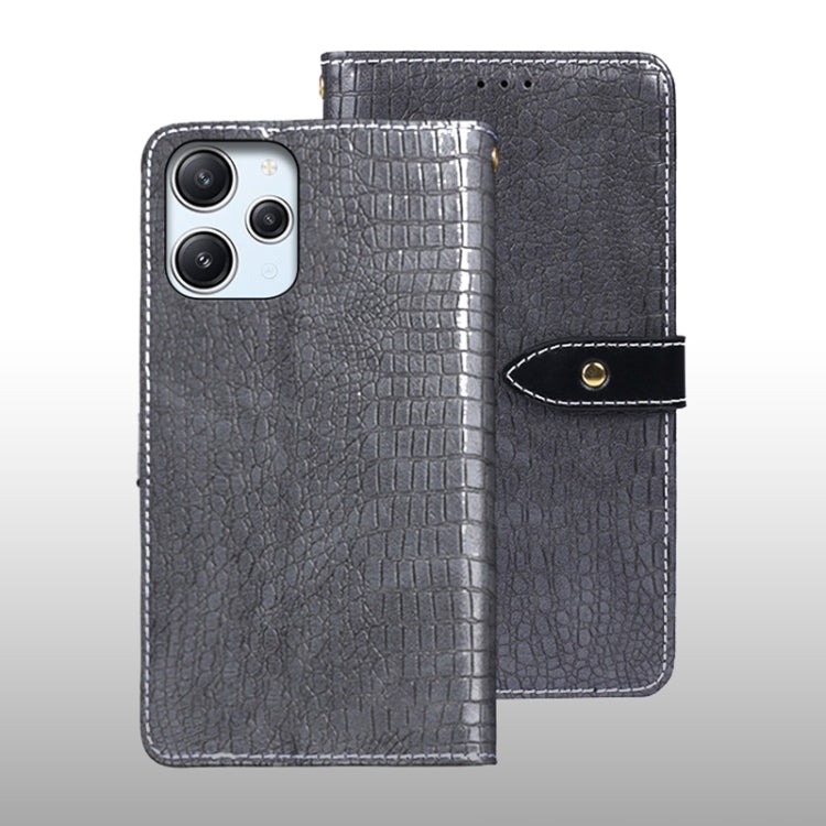 Grey crocodile-texture leather flip phone case with wrist strap and magnetic tab.
