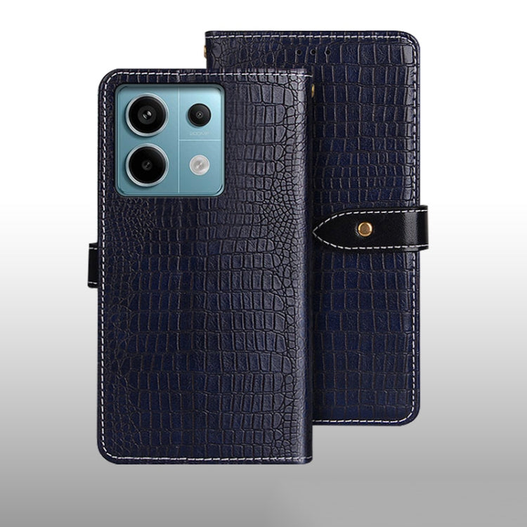Dark blue crocodile-texture leather flip phone case with wrist strap and magnetic tab.