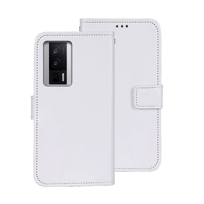 White leather wallet phone case with magnetic flap and camera cutout.