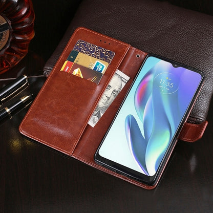 Brown leather phone case with flip cover, visible card slots, and holder stand