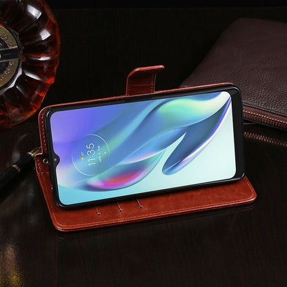 Brown leather phone case with open flip cover and phone inside